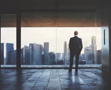bigstock-Businessman-looking-at-city-59349905 bigstock-Businessman-looking-at-city-59349905