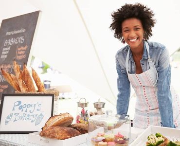 bigstock-Female-Bakery-Stall-Holder-At-87399380