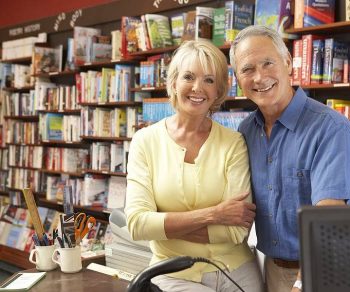 bigstock-Couple-running-bookshop-13904324
