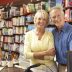 bigstock-Couple-running-bookshop-13904324