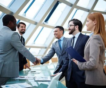 bigstock-Two-businessmen-handshaking-af-66427792