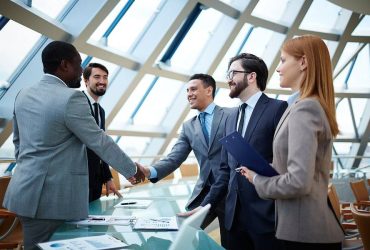 bigstock-Two-businessmen-handshaking-af-66427792