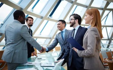 bigstock-Two-businessmen-handshaking-af-66427792 bigstock-Two-businessmen-handshaking-af-66427792