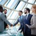 bigstock-Two-businessmen-handshaking-af-66427792