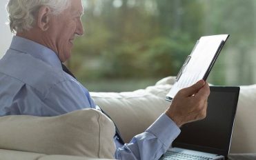 bigstock-Retired-Businessman-Analyzing-79838929