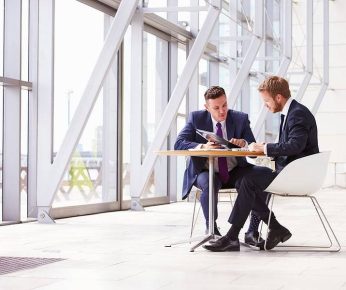 bigstock-Two-business-colleagues-at-mee-101229776-1-1 bigstock-Two-business-colleagues-at-mee-101229776-1-1