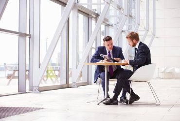 bigstock-Two-business-colleagues-at-mee-101229776-1-1
